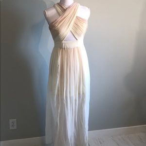 Blush, nude, and cream maxi dress cut out details